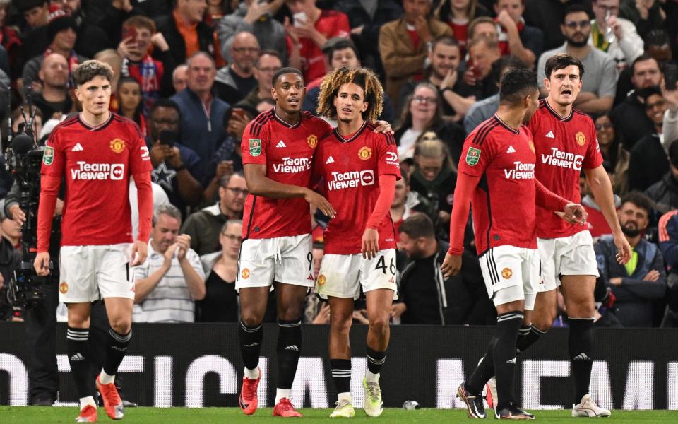 Manchester United's French striker #09 Anthony Martial celebrates scoring his team third goal