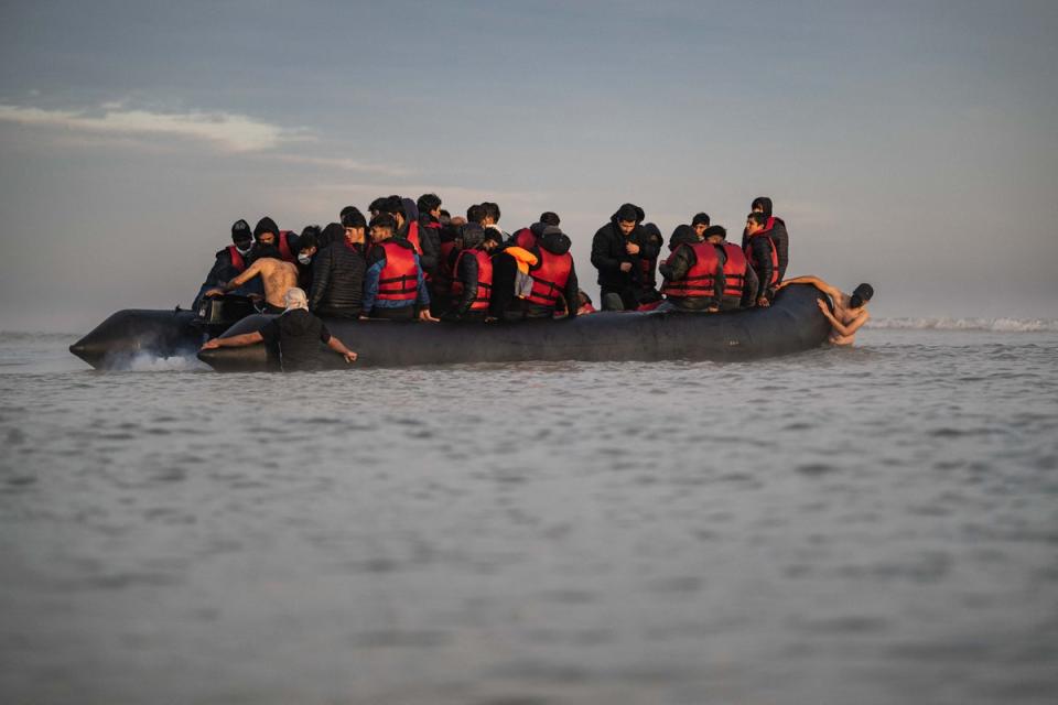 Migrants are trying riskier and longer routes to the UK as French police up their presence on the beaches (AFP via Getty Images)