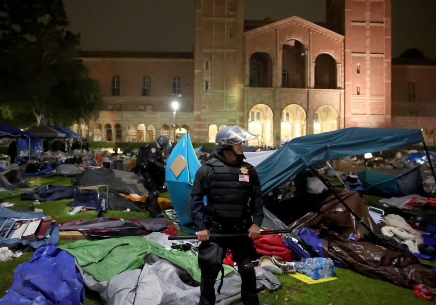 LOS ANGELES CA MAY 2, 2024 — Police tear down the tents on the UCLA campus Thursday, May 2, 2024. (Jason Armond / Los Angeles Times via Getty Images)