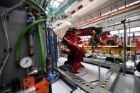 Ceremony to mark the installation of the first robot on the production line for the new electric Fiat 500 BEV at the Mirafiori industrial complex on the 80th birthday of the plant