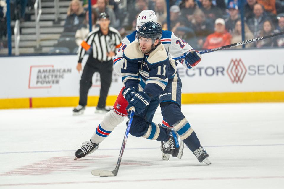 Oct 14, 2023; Columbus, Ohio, United States;
Columbus Blue Jackets center Adam Fantilli (11) looks for an open pass during their game against the New York Rangers on Saturday, Oct. 14, 2023 at Nationwide Arena.