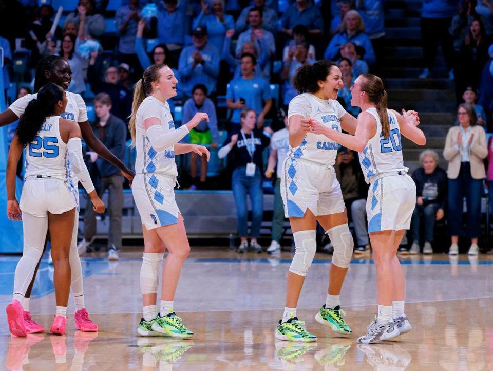 North Carolina celebrates after defeating N.C. State 80-70 on Thursday, Feb. 22, 2024, at Carmichael Arena in Chapel Hill, N.C. Kaitlin McKeown/kmckeown@newsobserver.com