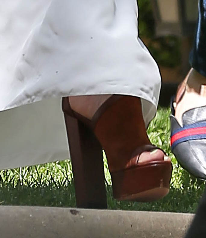 A closer look at Jennifer Lopez brown suede platform sandals. - Credit: MESSIGOAL / SplashNews.com