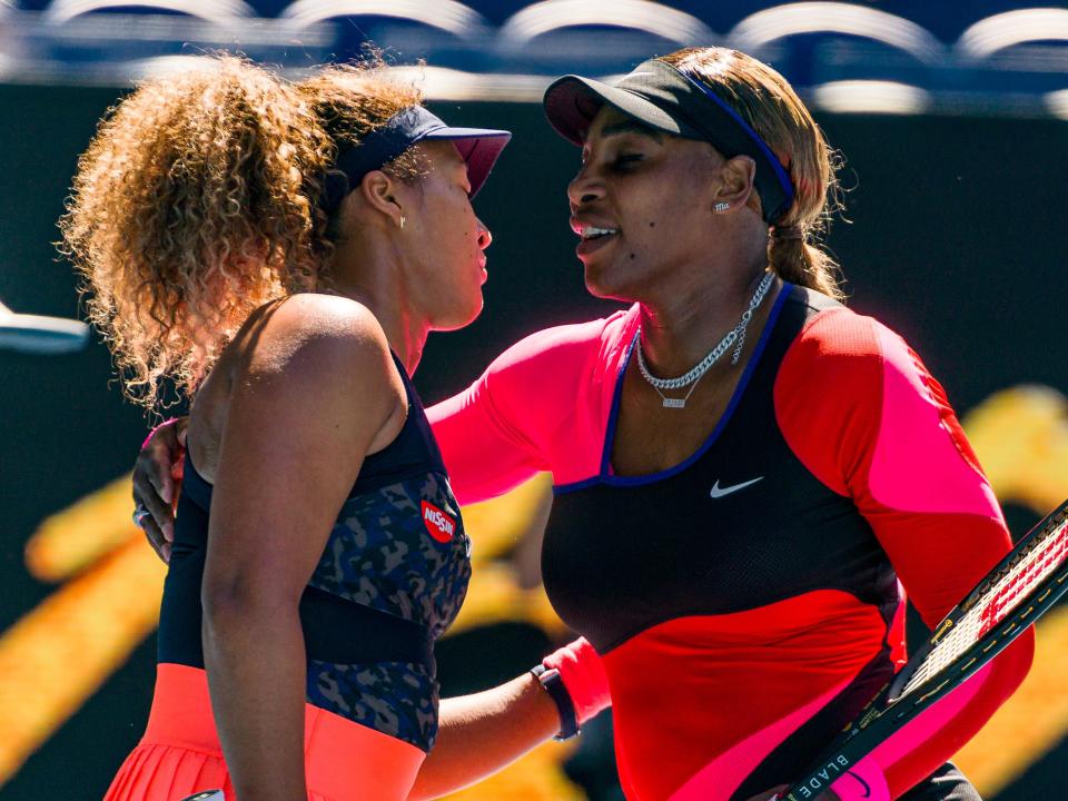 Naomi Osaka of Japan shakes hands with Serena Williams of the United States in their Women’s Singles Semifinals match during day 11 of the 2021 Australian Open at Melbourne Park on February 18, 2021 in Melbourne, Australia.