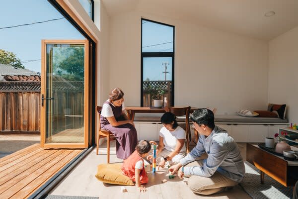 While Abobu offers several different options for the living room flooring, light oak is provided by default. The ADU pictured here features a few customizable features, including the 4'x10' deck, folding glass doors, and storage bench.