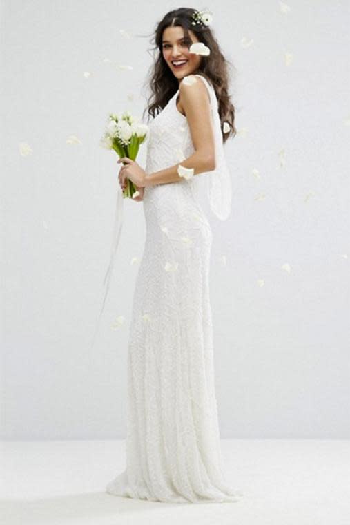 Amelia Rose Bridal Cowl Back Maxi Dress In All Over Embellishment - <a rel="nofollow noopener" href="http://www.asos.com/amelia-rose/amelia-rose-bridal-cowl-back-maxi-dress-in-all-over-embellishment/prd/7420705?iid=7420705&clr=Ivory&SearchQuery=bridal&pgesize=37&pge=0&totalstyles=37&gridsize=3&gridrow=2&gridcolumn=3" target="_blank" data-ylk="slk:$302.59;elm:context_link;itc:0;sec:content-canvas" class="link ">$302.59</a>