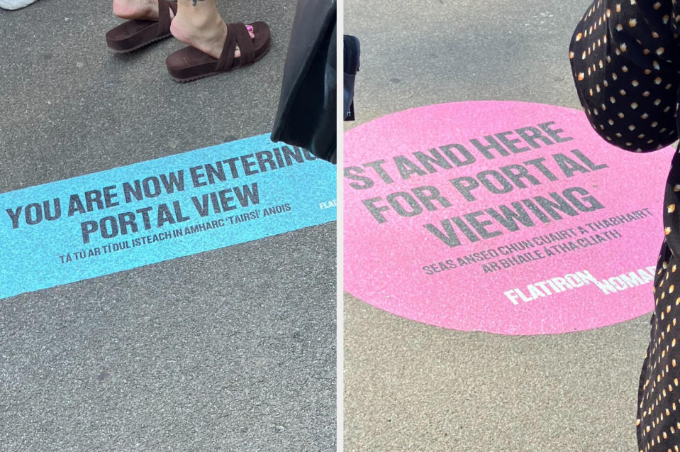 Two sidewalk signs. The left sign reads, "YOU ARE NOW ENTERING PORTAL VIEW." The right sign reads, "STAND HERE FOR PORTAL VIEWING." Both signs by Flatiron