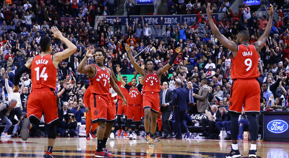 Put your hands up if you’re going to play in the postseason. (Photo by Vaughn Ridley/Getty Images)