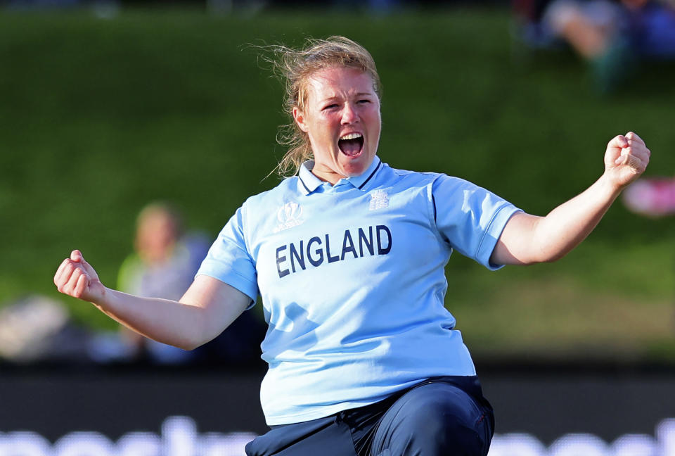 England's Anya Shrubsole celebrates a caught and bowled catch of South Africa's Laura Wolvaardt for no runs during their semifinal of the Women's Cricket World Cup cricket match in Christchurch, New Zealand, Thursday, March 31, 2022. (Martin Hunter/Photosport via AP)