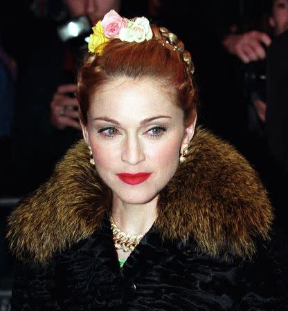 Actress and pop star Madonna arrives for the premiere of the movie 'Evita' in which she plays the lead role of Eva Peron in Leicester Square, London, in this December 19, 1996, file photo. REUTERS/Kevin Lamarque/Filers
