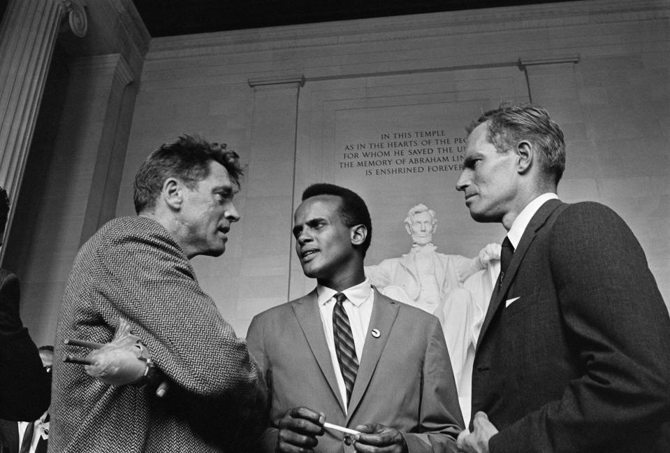 L-R; US actor Burt Lancaster, US singer Harry Belafonte and US actor Charlton Heston chat inside Lincoln Memorial during the "March on Washington for Jobs and Freedom" on August 28, 1963 in Washington, D.C., United States. - During the march of August 28, 1963, Martin Luther King, standing in front of the Lincoln Memorial, delivered his historic "I Have a Dream" speech in which he called for an end to racism. 