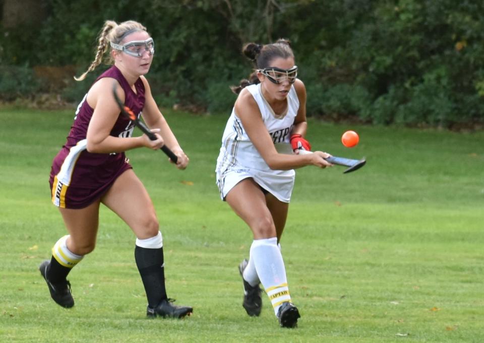 Case's Lexi Yost, left, gives chase with Westport's Avery Avila during a recent home game against Joseph Case.