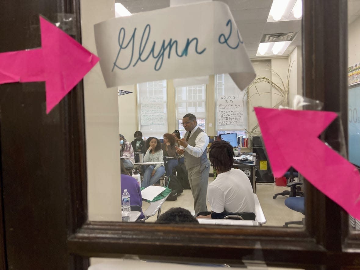 Emmitt Glynn is seen on Jan. 30, 2023 from just outside his classroom teaching his second AP African American studies class at Baton Rouge Magnet High School in Baton Rouge, Louisiana. (AP Photo/Stephen Smith)