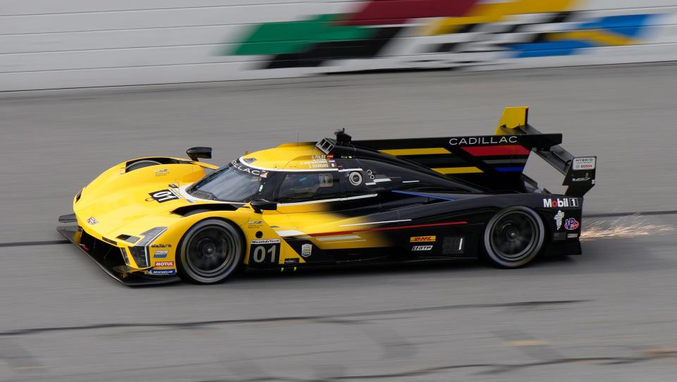 The No. 01 Cadillac throws sparks during Roar Before the 24 pole qualifying for the Rolex 24 at Daytona at Daytona International Speedway, Sunday, Jan. 21, 2024.