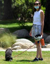 <p>Also on doggie duty on Monday, Gal Gadot, who walks her pooch Beverly Hills. </p>