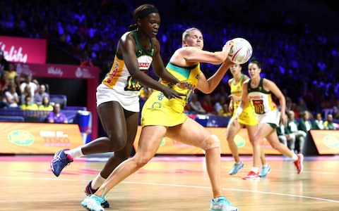 Australia's Caitlin Thwaites and South Africa's Phumza Maweni battle for the ball  - Credit: PA