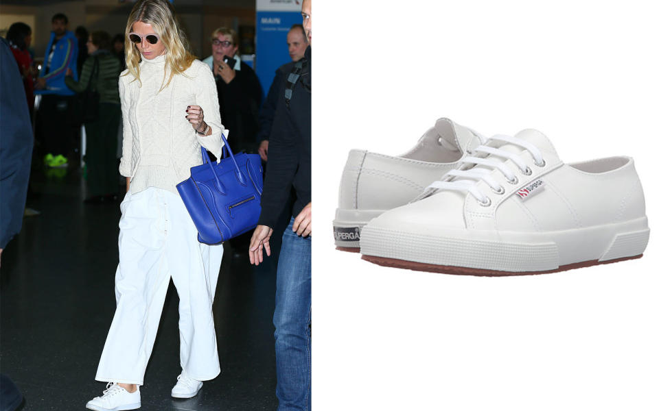 <p>It's safe to say that a good pair of white, low-top kicks are basically the little black dress of sneakers. Whether you're pairing any variety of these sneakers with jeans and a cute top, trendy sweats, or a sundress, white sneakers should always be a staple in every stylish traveler's closet. Here, Gwyneth Paltrow cruises through the airport with an all-white outfit, accented by a bold blue handbag. </p> <p>To buy: <a rel="nofollow noopener" href="https://www.amazon.com/Superga-2750-Classic-Plimsoll-Trainers/dp/B00IGQRO5E/" target="_blank" data-ylk="slk:amazon.com;elm:context_link;itc:0;sec:content-canvas" class="link ">amazon.com</a>, from $60</p>