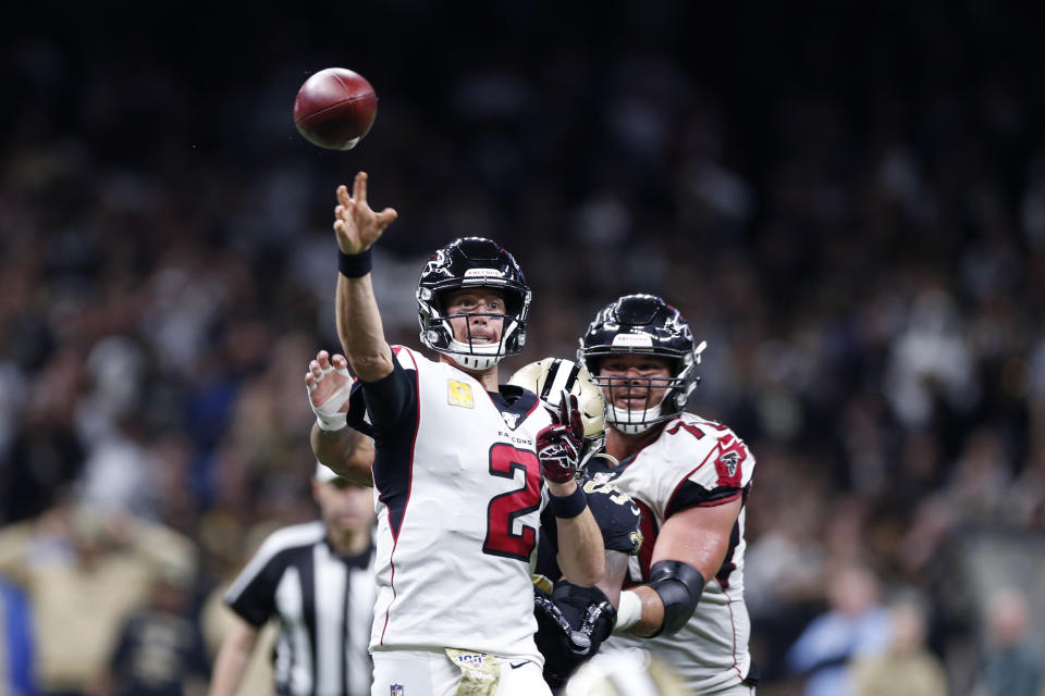 Atlanta Falcons quarterback Matt Ryan (2) throws a touchdown pass to running back Brian Hill, not pictured, in the second half of an NFL football game against the New Orleans Saints in New Orleans, Sunday, Nov. 10, 2019. (AP Photo/Rusty Costanza)