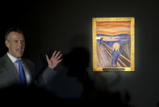 Simon Shaw of Sotheby's speaks about Edvard Munch's "The Scream" during a press preview for Sotheby's Masters Auction in New York