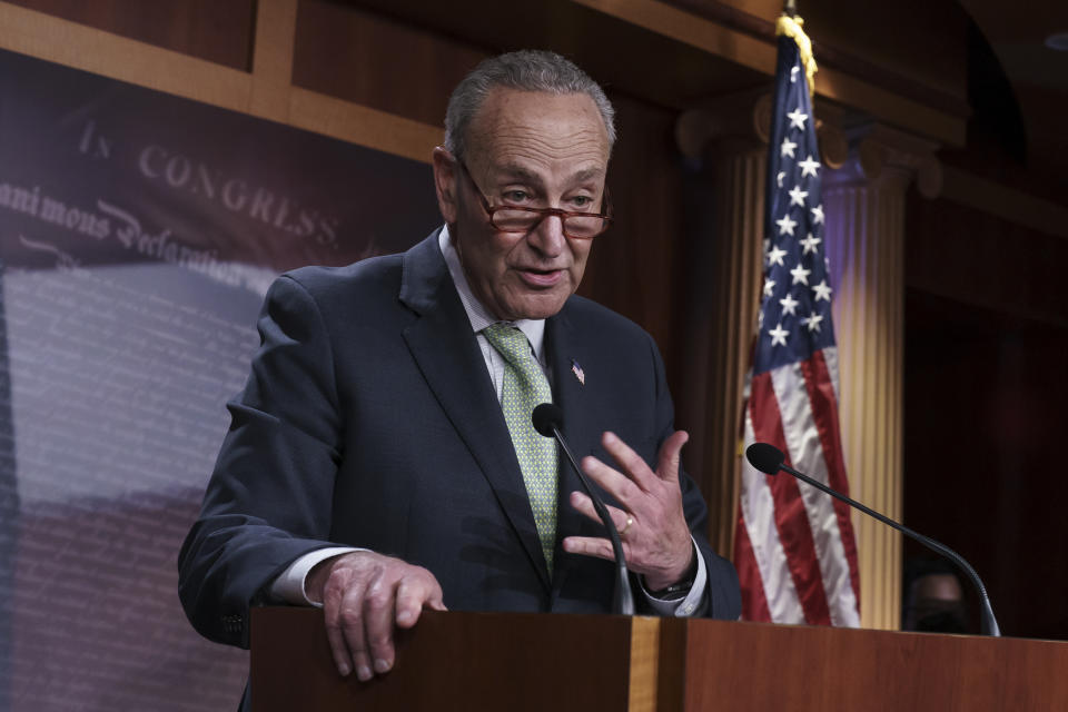 Senate Majority Leader Chuck Schumer, D-N.Y., talks to reporters about the expansive agreement reached with Sen. Joe Manchin, D-W.Va., that they had sought for months on health care, energy and climate issues, and taxes on higher earners and corporations, at the Capitol in Washington, Thursday, July 28, 2022. (AP Photo/J. Scott Applewhite)