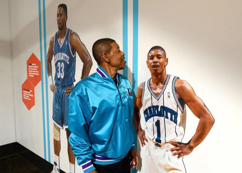 One of the most popular Hornets players of all time, Muggsy Bogues, toured the Charlotte Museum of History’s new exhibit celebrating the Hornets’ 35th anniversary. Bogues measures himself against an exhibit photo of him during his playing days.