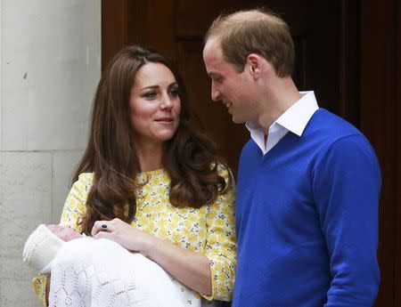 Britain's Prince William and his wife Catherine, Duchess of Cambridge, appear with their baby daughter outside the Lindo Wing of St Mary's Hospital, in London, Britain May 2, 2015. REUTERS/Cathal McNaughton