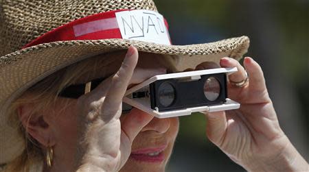 Betty Chambers, of Key West awaits the arrival of U.S. long-distance swimmer Diana Nyad, 64, who completed her swim from Cuba to Key West, Florida, September 2, 2013. REUTERS/Andrew Innerarity