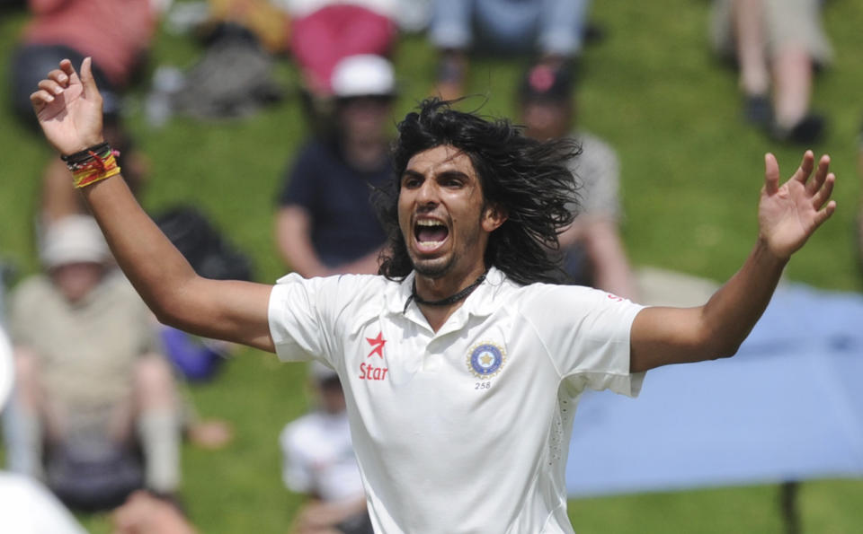 India’s Ishant Sharma claims a 5 wicket bag with the dismissal of New Zealand’s BJ Watling for 0 on the first day of the second cricket test in Wellington, New Zealand, Friday, Feb. 14, 2014. (AP Photo/SNPA, Ross Setford) NEW ZEALAND OUT