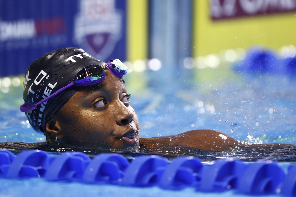 OMAHA, NEBRASKA - JUNE 17: Simone Manuel of the United States reacts after competing in a preliminary heat for the Women’s 100m freestyle during Day Five of the 2021 U.S. Olympic Team Swimming Trials at CHI Health Center on June 17, 2021 in Omaha, Nebraska. (Photo by Tom Pennington/Getty Images)