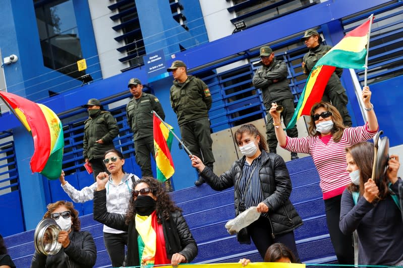 Demonstrators participate in a protest in La Paz