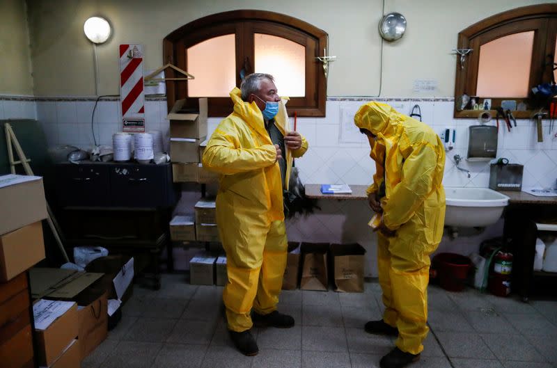 FILE PHOTO: Gravediggers work as Argentine coronavirus death toll mounts amid a deadly second wave of infections