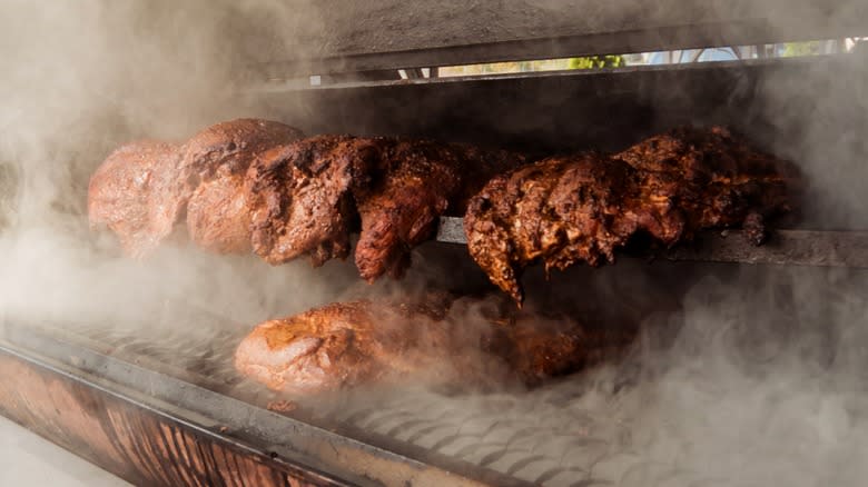 Meat in a smoker griller