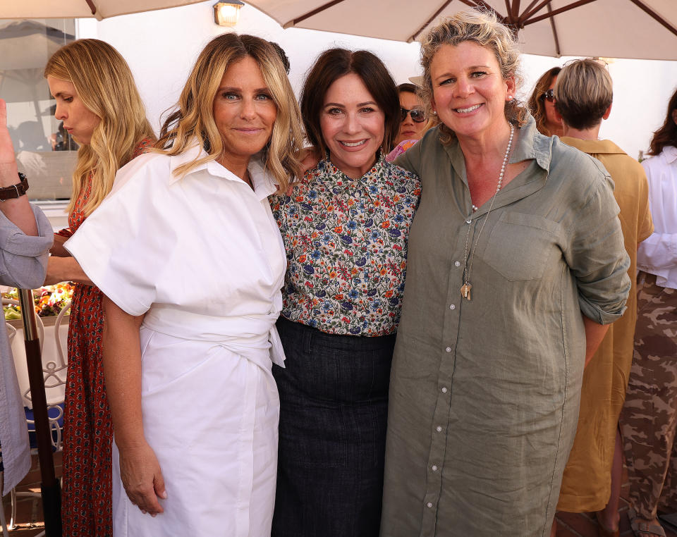 Sarah Tallman, Shannon Ryan and Alison Rou pose at a launch event