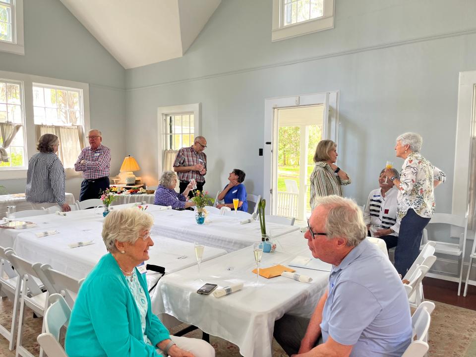 Hilda McCarter caught up with her former Hartsfield Elementary students during a luncheon held at Goodwood Museum and Gardens. After 68 years, the class reunited to honor the educator.