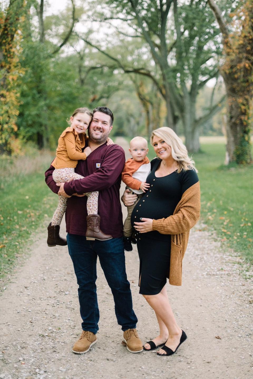 Nicholas and Sydney Jowett with their three-year-old daughter, Claire, and one-year-old son, Leo.