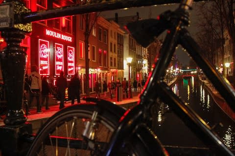 The red light district is one of Amsterdam's most popular neighbourhoods - Credit: GETTY