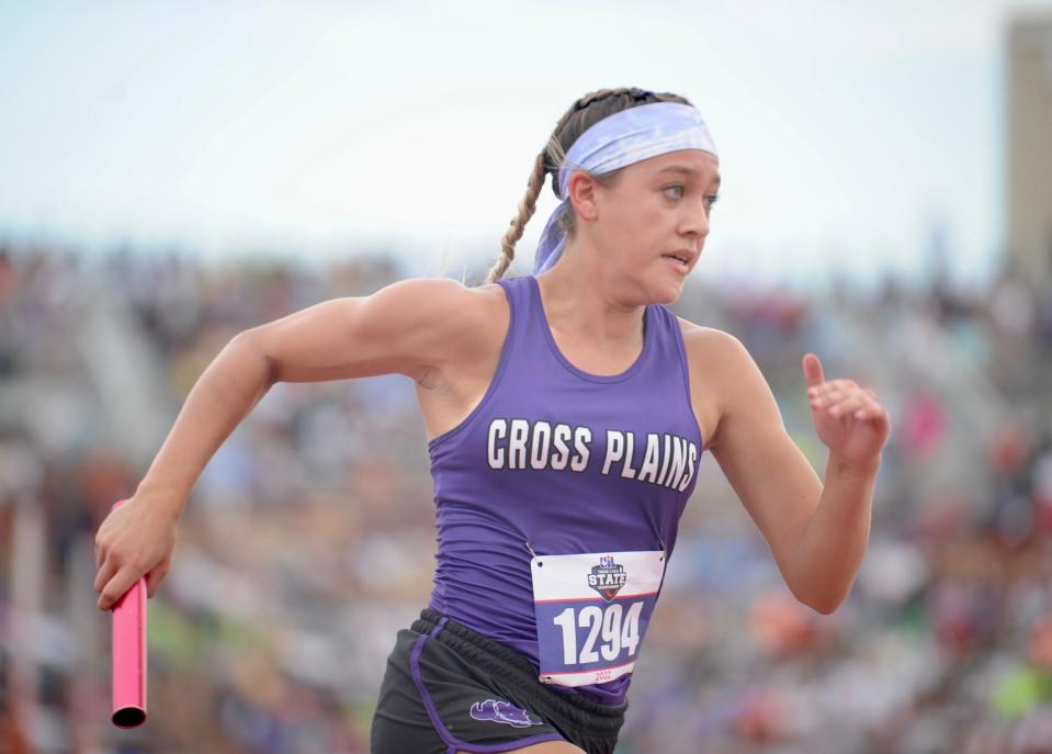 Cross Plains' Cadence Wedeking runs the 800 relay at the state track and field meet.