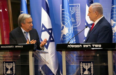 Israeli Prime Minister Benjamin Netanyahu (R) listens to U.N. Secretary General Antonio Guterres speak, as they deliver joint statements in Jerusalem August 28, 2017. REUTERS/Heidi Levine/Pool