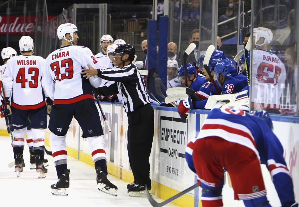 Washington Capitals' Zdeno Chara (33) talks to the New York Rangers' bench during the first period of an NHL hockey game Wednesday, May 5, 2021, in New York. (Bruce Bennett/Pool Photo via AP)