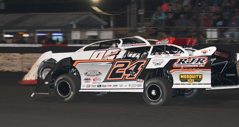 Although Ryan Unzicker (24) got beside of Tanner English in the late model feature, English was able to fend off the challenge and rode a line to his liking en route to winning the Allen Memorial race at Fairbury Speedway Saturday.