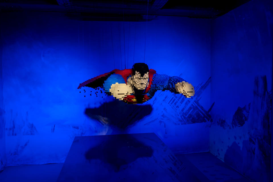 ROME, ITALY - NOVEMBER 30: The Superman sculpture in flight, entirely made with Lego bricks is seen during it the 'The Art of the Brick: DC Super Heroes' Exhibition at the Palace of Exams on November 30, 2017 in Rome, Italy. The exhibition called 'The Art of the Brick: DC Super Heroes' with 120 figures of superheroes with Lego bricks done by Nathan Sawaya will be on display at the Palace of Exams from 30 November to 28 January 2018. (Photo by Stefano Montesi - Corbis/Corbis via Getty Images)