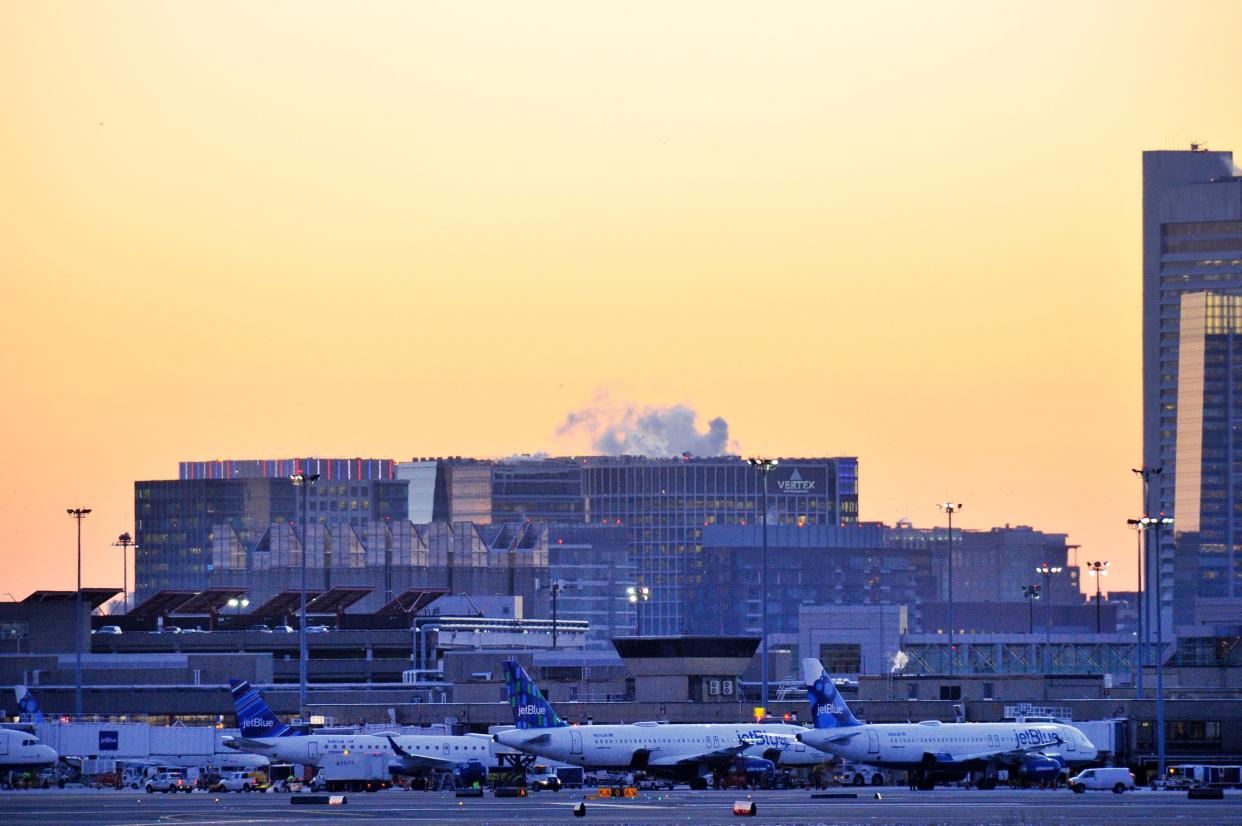 Aircraft wait at the terminals at Logan Airport in Boston, Massachusetts on January 31, 2019 on a day where over 2000 flights were cancelled and delayed due to extreme cold and ice conditions caused by the Polar Vortex.