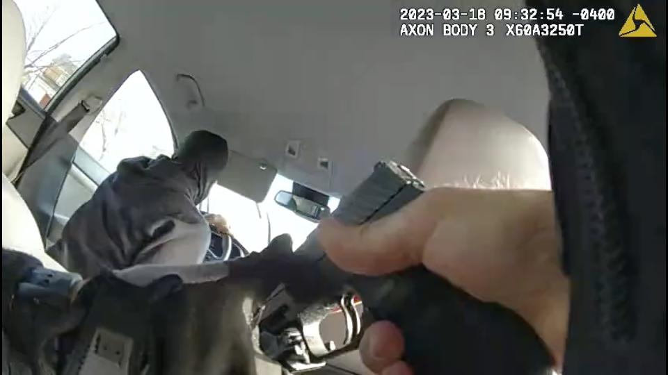 This image taken from police body camera video released by the U.S. Park Police shows 17-year-old Dalaneo Martin driving before being fatally shot on March 18, 2023, in Washington. The Justice Department has opened a federal civil rights investigation after a U.S. Park Police officer fatally shot Martin who drove off with an officer in the back seat after the teenager was found asleep in a suspected stolen car. (U.S. Park Police via AP)