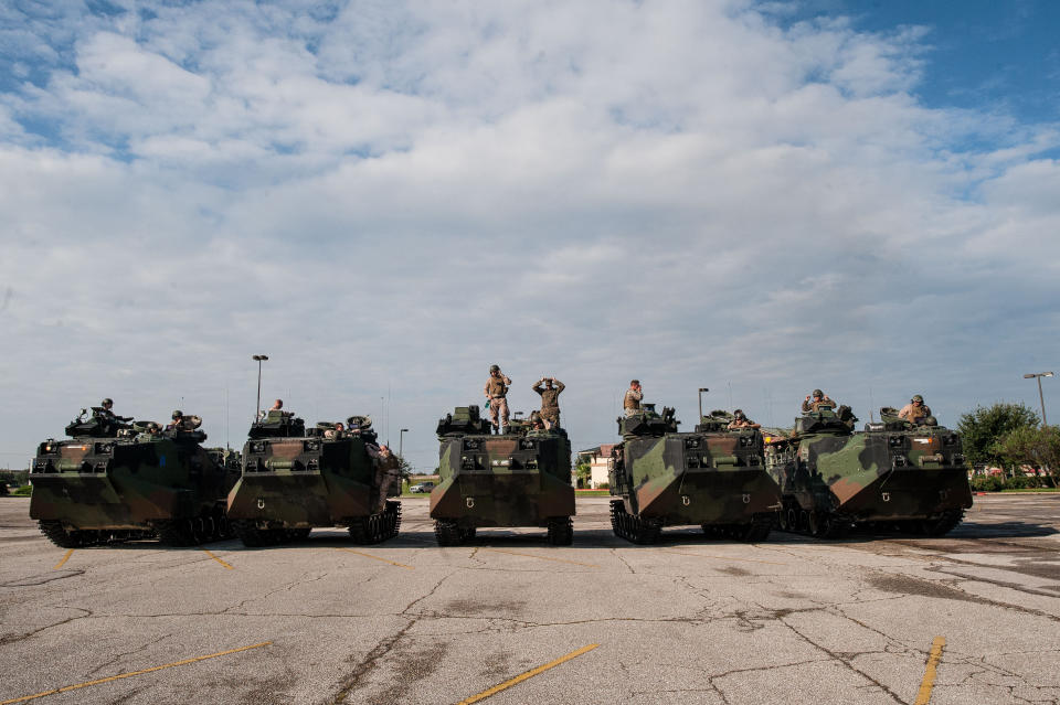 U.S. Marines arrive from Galveston Island in amphibious assault vehicles at&nbsp;the Central Mall in Port Arthur.