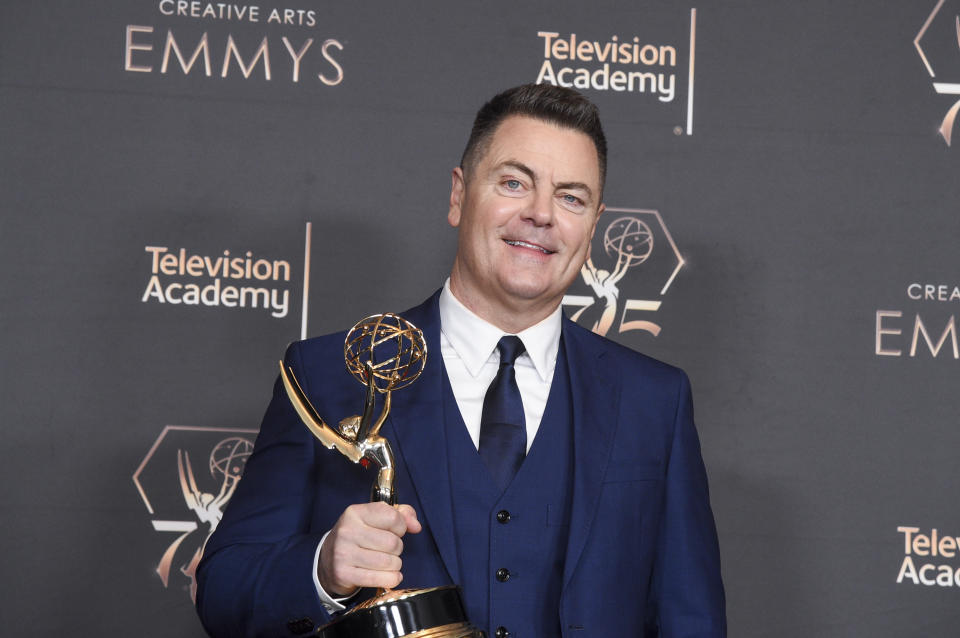 Nick Offerman poses in the press room with the award for outstanding guest actor in a drama series for "The Last Of Us - Long, Long Time" during night one of the Creative Arts Emmy Awards on Saturday, Jan. 6, 2024, at the Peacock Theater in Los Angeles. (Photo by Richard Shotwell/Invision/AP)