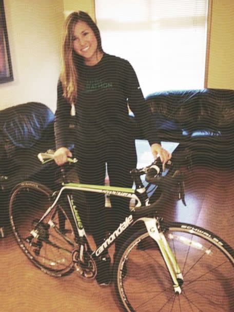 Cari Swanger poses with the first new bike she bought ahead of taking part in her first 100-mile ride. (ABC New Photo Illustration // Courtesy of Cari Swanger)