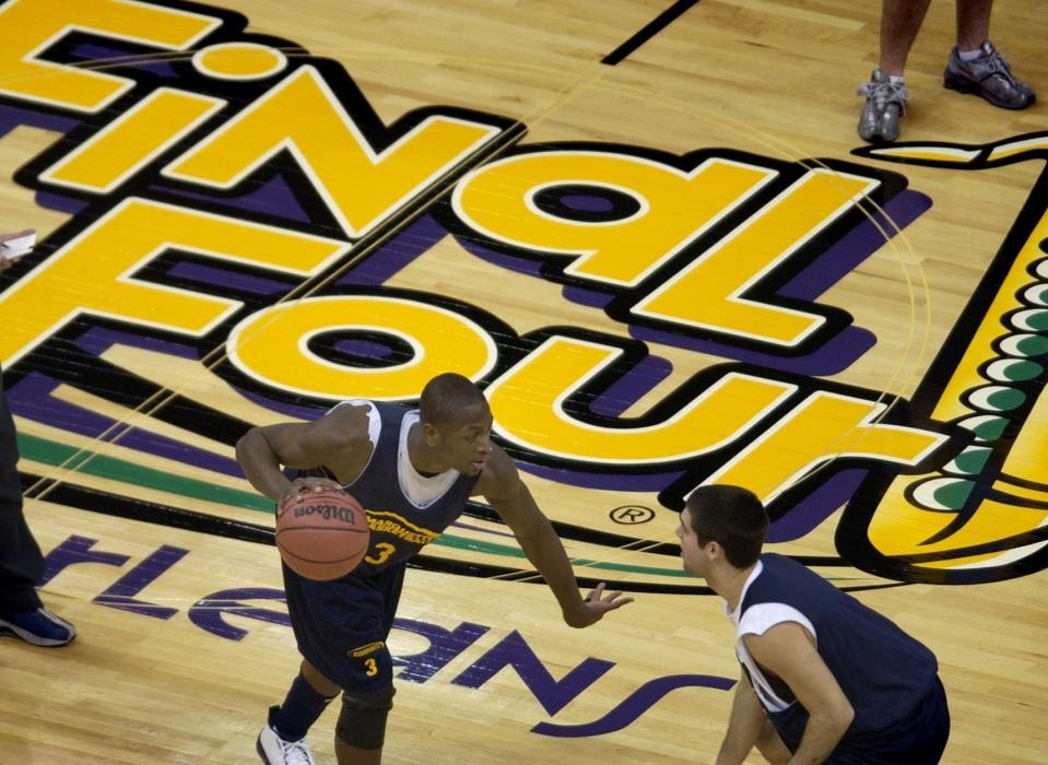 Dwyane Wade makes a move against a teammate during practice April, 4, 2003, at the Superdome in New Orleans.