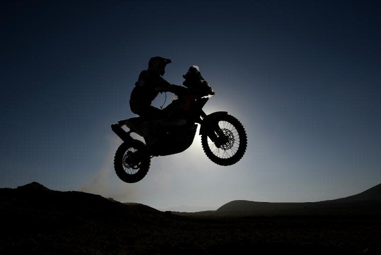 Spain's rider Marc Coma powers his KTM during the Stage 11 of the Dakar 2014 between Antofagasta and El Salvador, on January 16, 2014