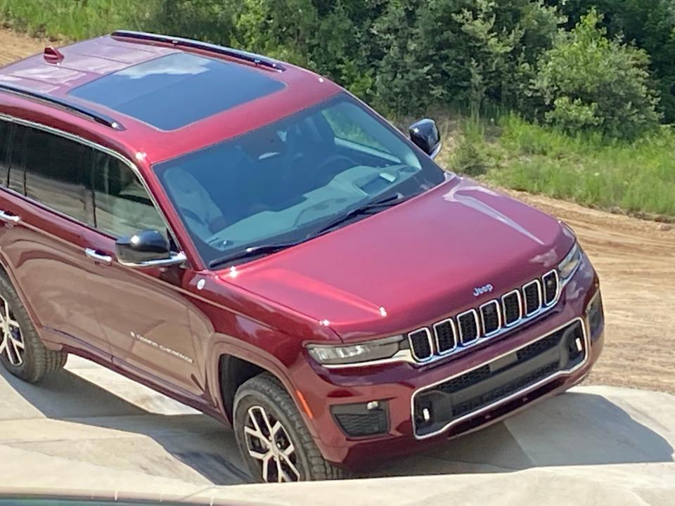 2021 Jeep Grand Cherokee L negotiates 'camel humps' with 14-inch dips and rises at Stellantis proving ground, Chelsea Michigan.