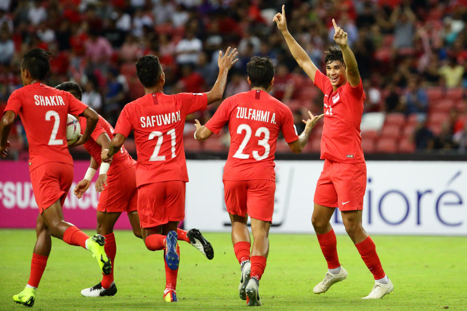 Singapore national striker Ikhsan Fandi (right) celebrates with his teammates during the AFF Suzuki Cup tournament in 2018